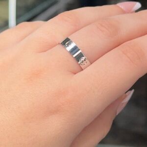 Silver screw marking ring